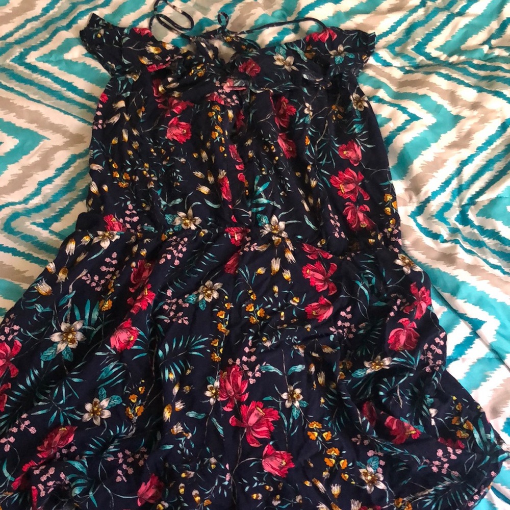 Flowered romper. Never worn!